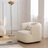 Nordic swivel accent chair in ivory boucle sherpa with white, gray, and blue tones